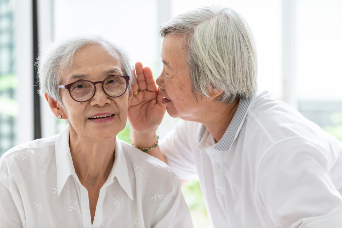 senior woman hearing loss