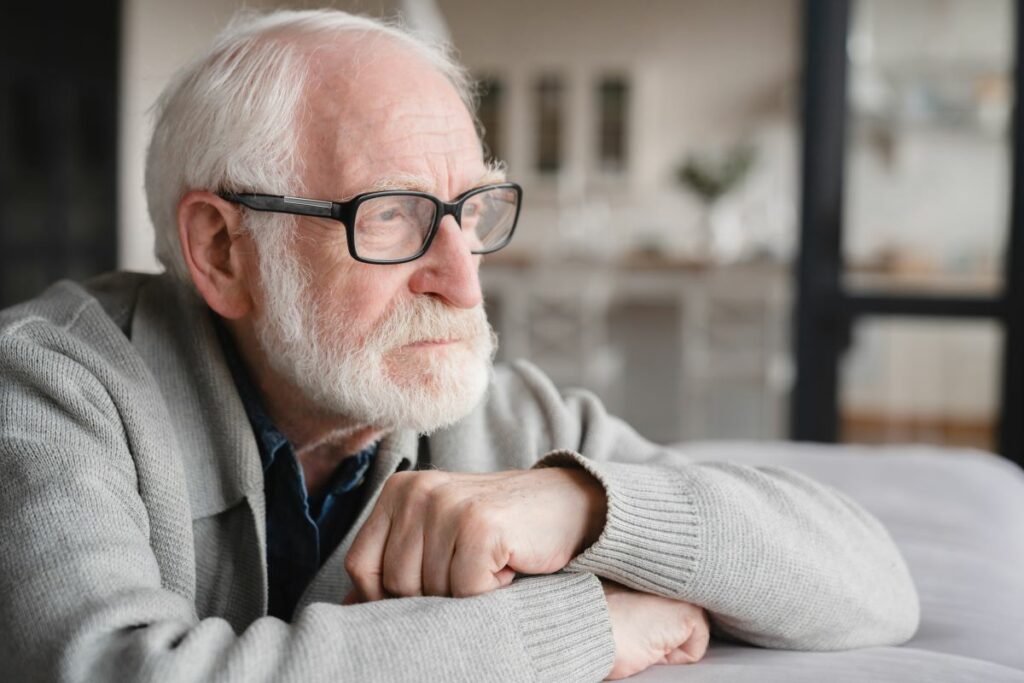 man elderly looking out