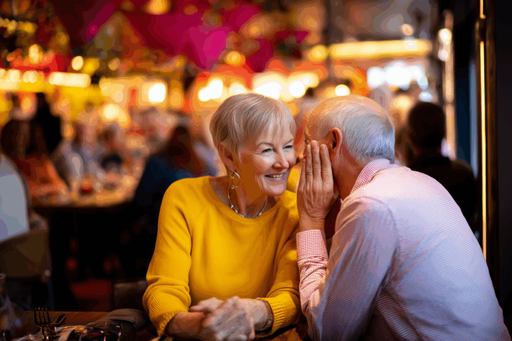 happy couple in their 60s seated